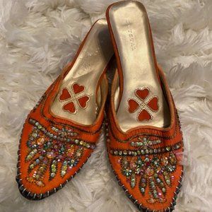 Orange beaded slip-on genie shoes